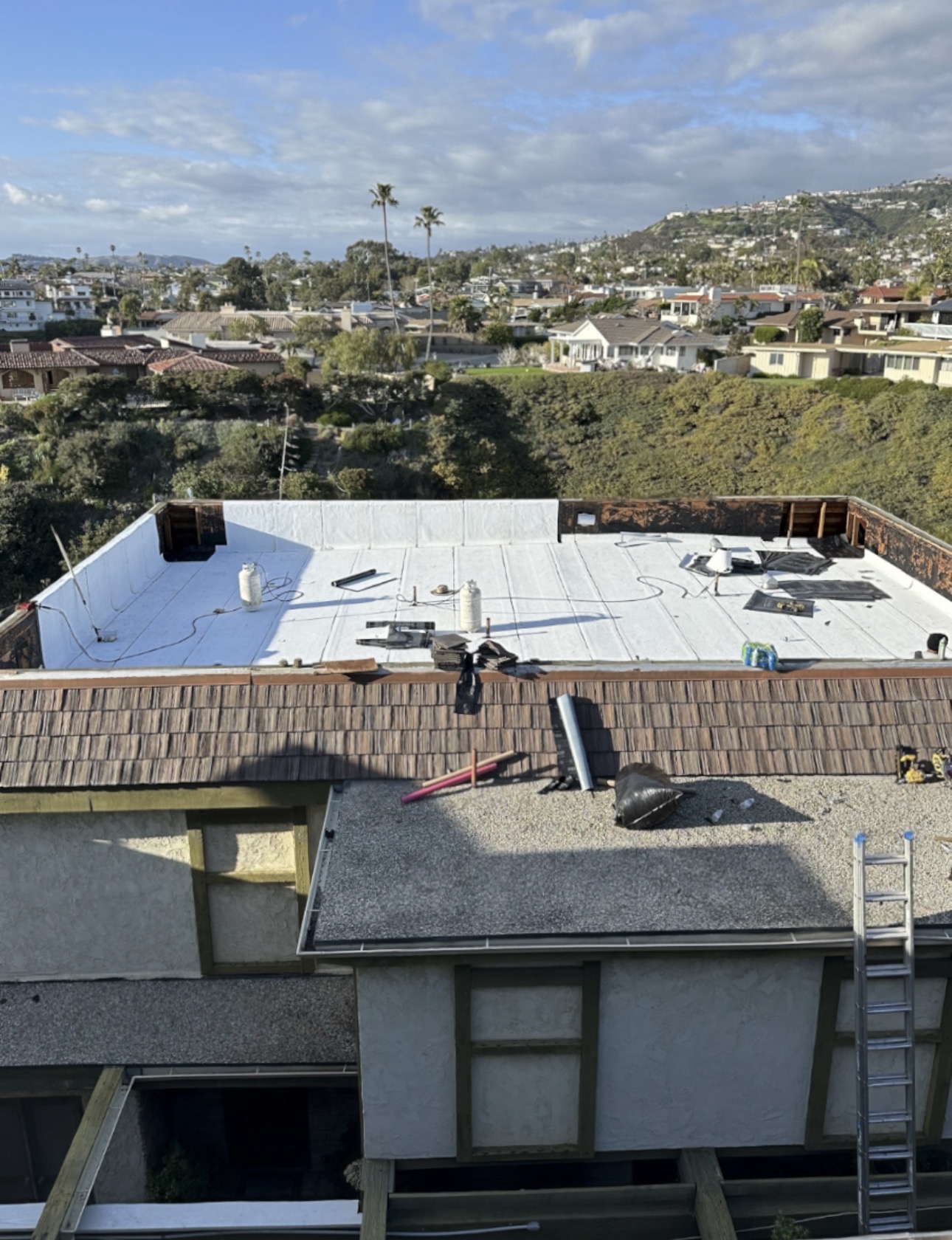 New TPO flat roof on a Los Angeles home with hillside and ocean view