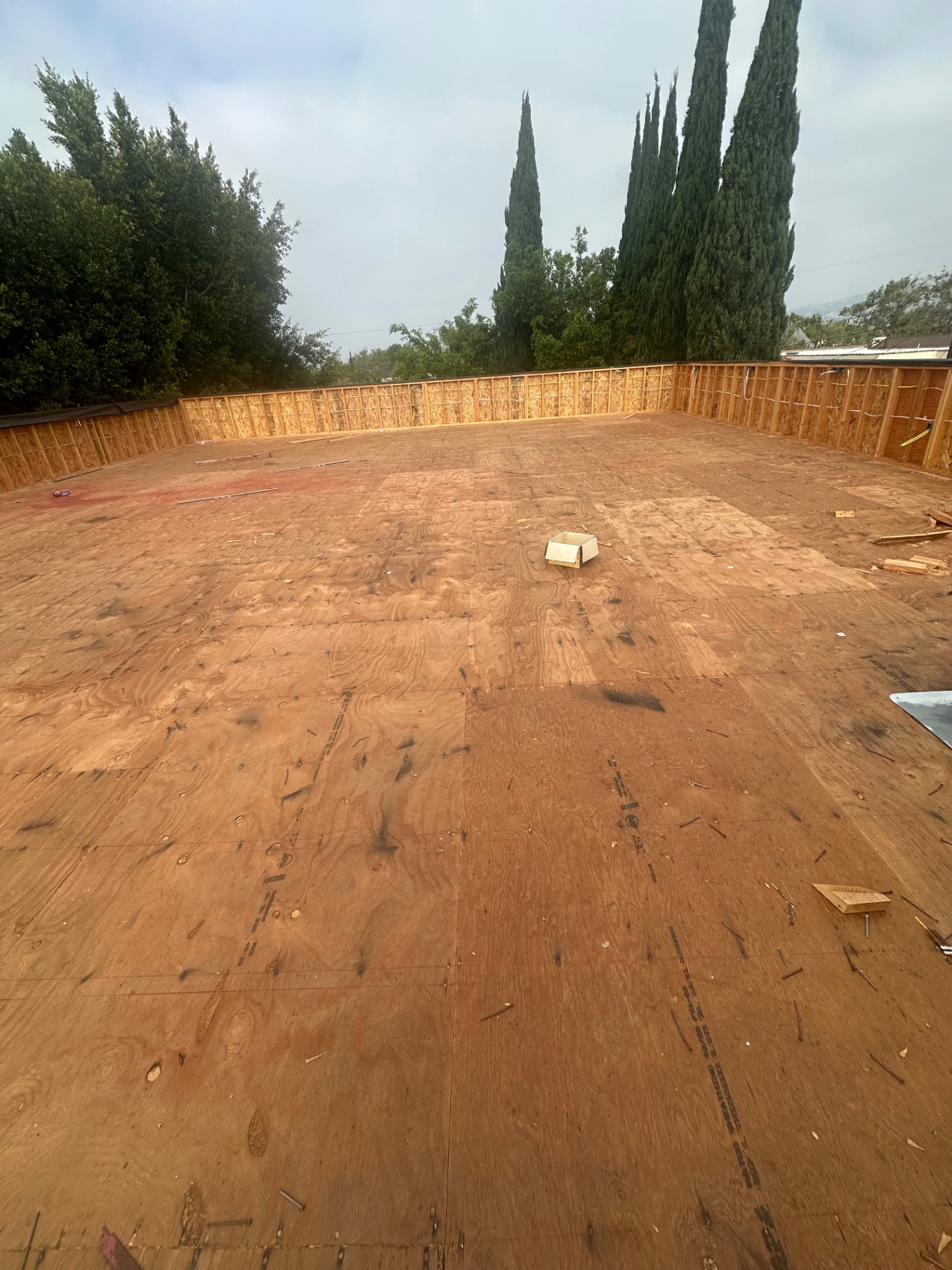 New plywood decking on a large flat roof addition in Los Angeles
