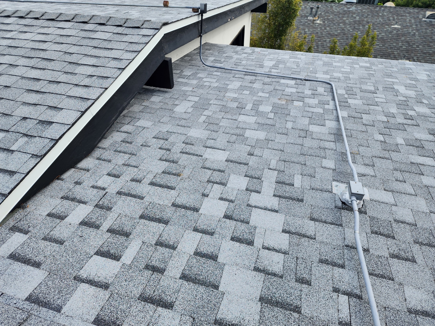 Detailed shingle roof valley and rake edge on a Los Angeles home